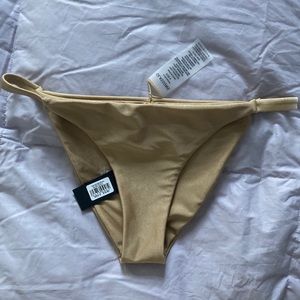 Glassons bikini brief, NWT. Gold, size 2-4